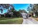 Ranch-style home with carport and spacious yard at 1329 Mount Pisgah Rd, Fort Meade, FL 33841