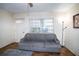 Living room with couch and ceiling fan at 1329 Mount Pisgah Rd, Fort Meade, FL 33841