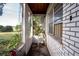 Screened porch with a plastic chair and plants at 1329 Mount Pisgah Rd, Fort Meade, FL 33841