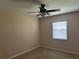 Simple bedroom with neutral walls and carpet at 137 Harbor Way, Auburndale, FL 33823