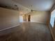 Open living room with tile floors and high ceilings at 137 Harbor Way, Auburndale, FL 33823