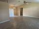 Spacious living room with tile floors and ceiling fan at 137 Harbor Way, Auburndale, FL 33823