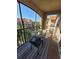 Private balcony with table and chairs, offering a pleasant view at 1371 Tuscan Ter # 3403, Davenport, FL 33896