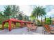 Relaxing cabanas and lounge chairs near pool at 1371 Tuscan Ter # 3403, Davenport, FL 33896