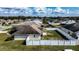 Aerial view of house and backyard, showcasing a spacious lot and surrounding neighborhood at 1548 Normandy Heights Blvd, Winter Haven, FL 33880