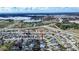 Aerial view of house in residential neighborhood near lake at 1548 Normandy Heights Blvd, Winter Haven, FL 33880