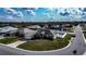 Aerial view of house and neighborhood, some roof damage visible at 1548 Normandy Heights Blvd, Winter Haven, FL 33880