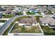 Aerial view showing house, backyard, and neighborhood; highlighting the property's location at 1548 Normandy Heights Blvd, Winter Haven, FL 33880