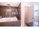 Primary bathroom with jacuzzi tub and separate shower at 1548 Normandy Heights Blvd, Winter Haven, FL 33880
