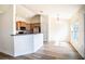 Bright dining area with wood floors and farmhouse style table at 1548 Normandy Heights Blvd, Winter Haven, FL 33880