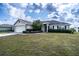 Single-story house with attached garage and well-manicured lawn at 1548 Normandy Heights Blvd, Winter Haven, FL 33880