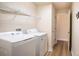 Laundry room with washer, dryer, and additional storage at 1548 Normandy Heights Blvd, Winter Haven, FL 33880
