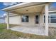 Covered patio with access from the house at 1548 Normandy Heights Blvd, Winter Haven, FL 33880