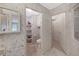 Bathroom with toilet, shelving, and linen closet at 1716 Quail Hill Dr, Lakeland, FL 33810