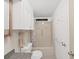 Clean bathroom with a tub and shower, toilet and vanity at 1716 Quail Hill Dr, Lakeland, FL 33810