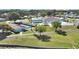 Aerial view of community amenities and lake at 1716 Quail Hill Dr, Lakeland, FL 33810