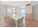 Bright dining area with table and chairs, kitchen view at 1716 Quail Hill Dr, Lakeland, FL 33810