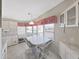 Bright kitchen nook with table and chairs near kitchen at 1716 Quail Hill Dr, Lakeland, FL 33810