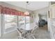 Cozy kitchen nook with table and chairs, near living room at 1716 Quail Hill Dr, Lakeland, FL 33810