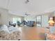 Relaxing living room featuring hardwood floors and comfortable seating at 1716 Quail Hill Dr, Lakeland, FL 33810