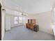 Home office with built-in desk and double French doors at 1716 Quail Hill Dr, Lakeland, FL 33810