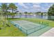 Paddleball court with lake view at 1716 Quail Hill Dr, Lakeland, FL 33810