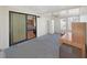 Sunroom with access to living area, ceiling fan and storage at 1716 Quail Hill Dr, Lakeland, FL 33810