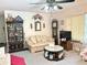 Living room with sofa, coffee table, and TV at 1865 4Th Se St, Winter Haven, FL 33880