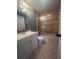 Clean bathroom with a tub and updated vanity at 19 Aspen Dr. # 19, Haines City, FL 33844