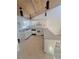 Modern kitchen with white cabinetry and breakfast bar at 19 Aspen Dr. # 19, Haines City, FL 33844