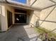 Private patio with small plants and a view of the surrounding area at 19 Aspen Dr. # 19, Haines City, FL 33844