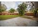 Large backyard with patio and grassy area, perfect for entertaining at 2104 John Arthur Way, Lakeland, FL 33803