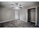 Well-lit bedroom with plush carpeting and ample closet space at 2104 John Arthur Way, Lakeland, FL 33803