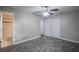 Bedroom with ensuite bathroom and double doors to closet at 2104 John Arthur Way, Lakeland, FL 33803