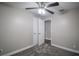 Bedroom with double doors leading to another room at 2104 John Arthur Way, Lakeland, FL 33803