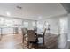 Kitchen and dining area with hardwood floors at 2104 John Arthur Way, Lakeland, FL 33803