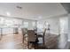 Dining area adjacent to kitchen with a round table and four chairs at 2104 John Arthur Way, Lakeland, FL 33803