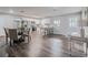 Kitchen dining area with a round wooden table and four chairs at 2104 John Arthur Way, Lakeland, FL 33803