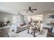 Bright living room with hardwood floors, comfy sofa, and stylish coffee table at 2104 John Arthur Way, Lakeland, FL 33803