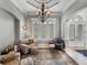 Formal living room featuring a chandelier and an entryway to the home's exterior at 221 Mclean Pt, Winter Haven, FL 33884