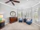 Sitting area in main bedroom filled with natural light at 221 Mclean Pt, Winter Haven, FL 33884