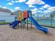 Community playground with slides and climbing structures at 221 Mclean Pt, Winter Haven, FL 33884