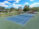 Well-maintained community tennis court at 221 Mclean Pt, Winter Haven, FL 33884