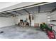 Spacious garage with storage and lawn equipment at 2428 Wildwood Ct, Winter Haven, FL 33884