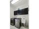 Laundry room with washer, dryer, cabinets, and sink at 2428 Wildwood Ct, Winter Haven, FL 33884