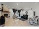 Bright living room with a stone fireplace and comfortable seating at 2428 Wildwood Ct, Winter Haven, FL 33884