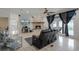 Relaxing living room with a fireplace, and access to the pool area at 2428 Wildwood Ct, Winter Haven, FL 33884
