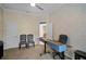 Functional home office with standing desk and plenty of space at 2428 Wildwood Ct, Winter Haven, FL 33884
