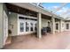 Covered patio with outdoor dining furniture at 2428 Wildwood Ct, Winter Haven, FL 33884