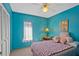 Bedroom featuring a full bed, window, and closet at 25 Aviation Dr, Winter Haven, FL 33881